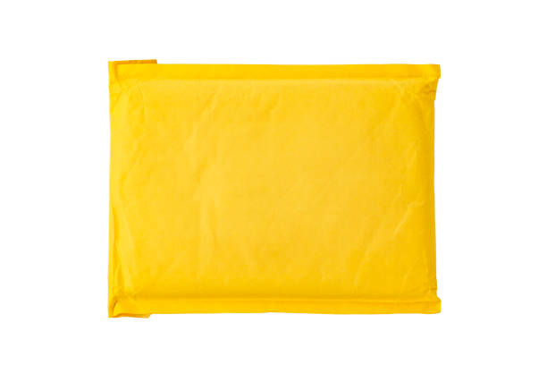 istock yellow postal bag for packing parcels. Isolated on white background. 1160550493
