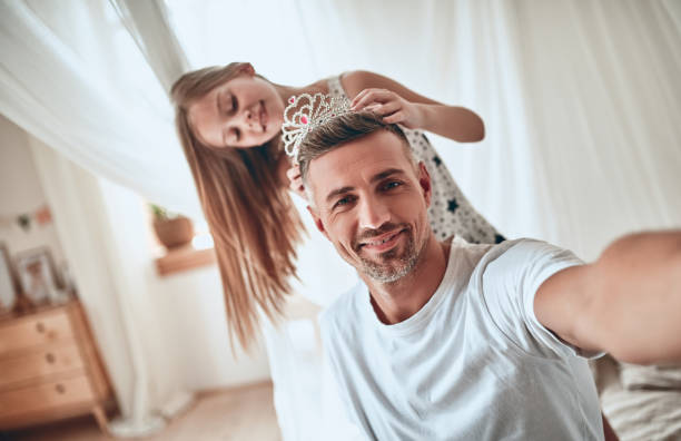 istock Father and daughter at home 1160553216