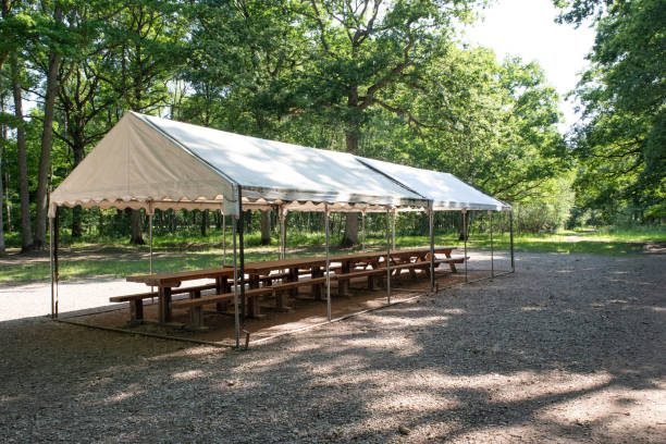 istock Picnic area in the forest with table and tent 1160554494