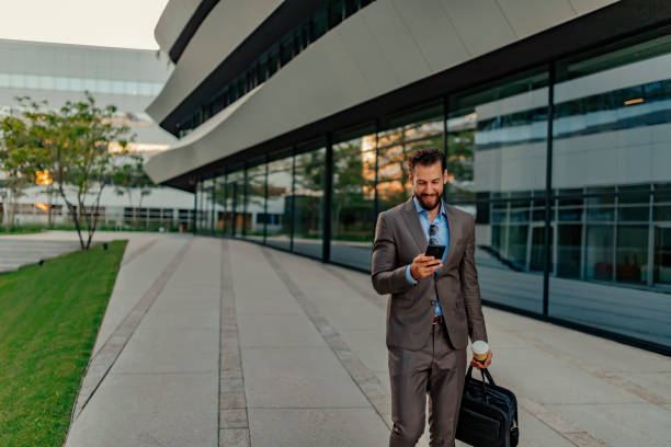istock Businessman Using Smartphone in the Urban Environment 1160554565