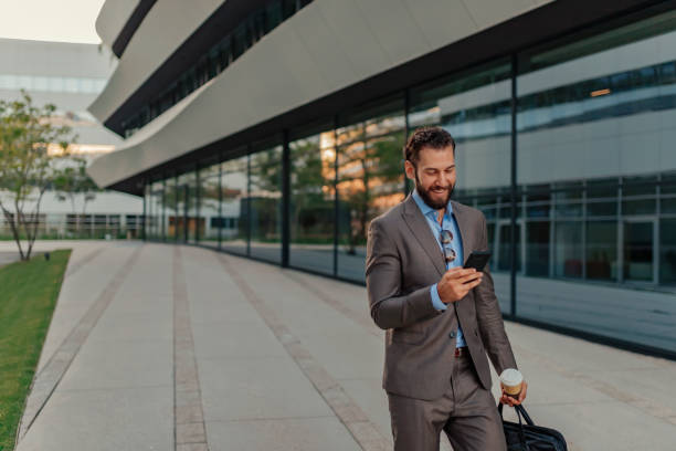 istock Businessman Using Smartphone in the Urban Environment 1160554593