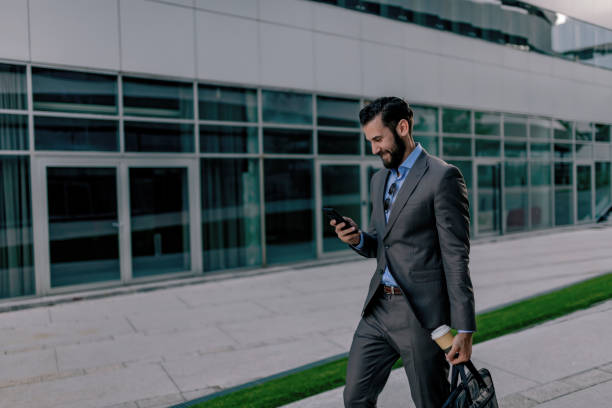 istock Businessman Using Smartphone in the Urban Environment 1160554595