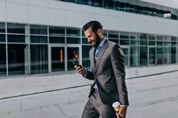 istock Businessman Using Smartphone in the Urban Environment 1160555328