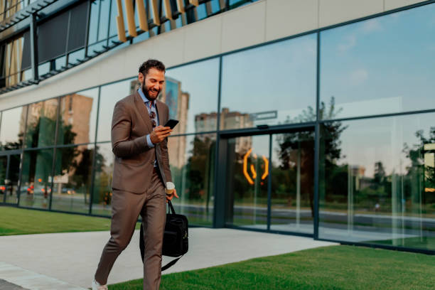 istock Businessman Using Smartphone in the Urban Environment 1160555445
