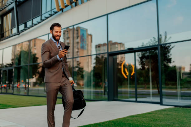 istock Businessman Using Smartphone in the Urban Environment 1160555494