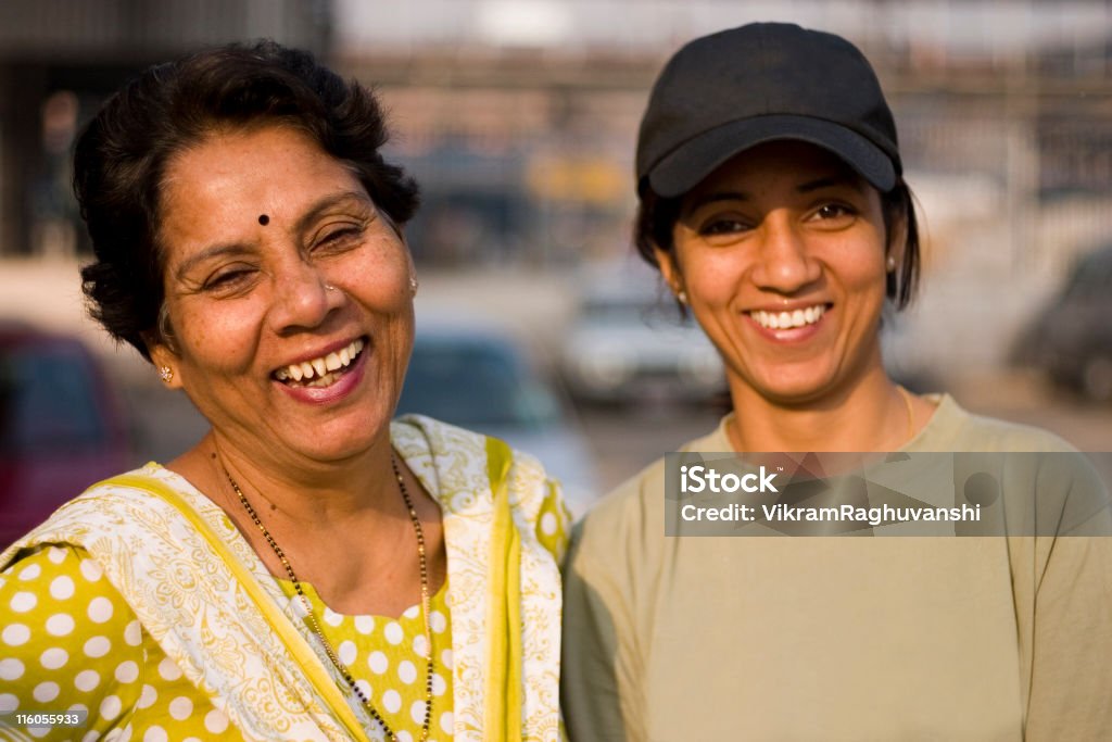 Cheerful Indian Asian Mother Daughter Female Woman People Horizontal Outdoor Indian Mother & Daughter smiling Culture of India Stock Photo