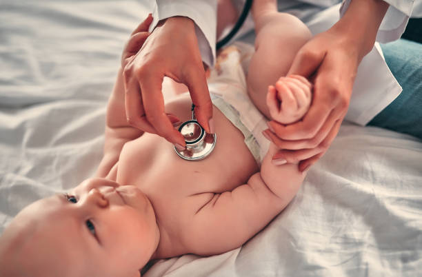 istock Doctor with newborn baby 1160559709