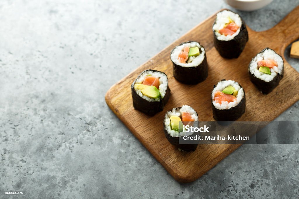Salmon avocado sushi rolls Homemade salmon avocado sushi rolls Sushi Stock Photo