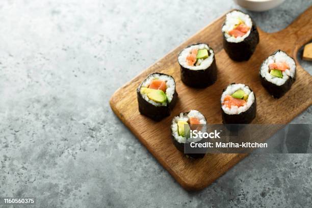 Salmon Avocado Sushi Rolls Stock Photo - Download Image Now - Sushi, Maki Sushi, Salmon - Seafood