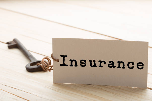 istock Insurance - tag on key, home security and insurance concept 1160562427