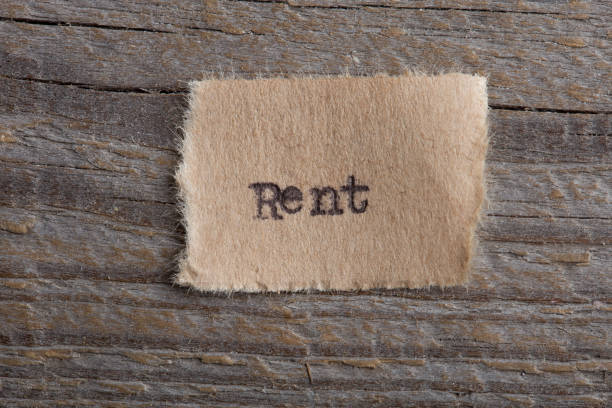 istock Rent typed text on a paper, real estate concept 1160563739