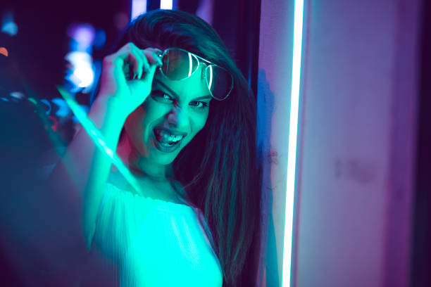 istock Woman and neon light 1160563947