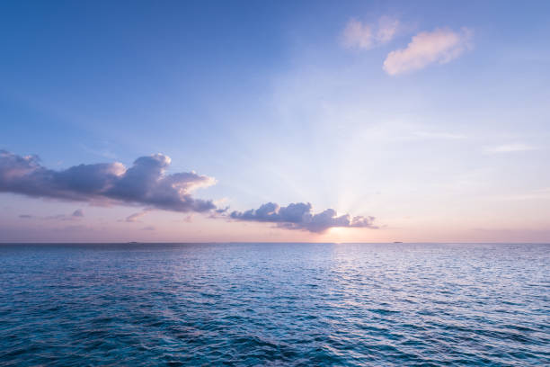 istock Sunset over the ocean in gentle tones. 1160564744