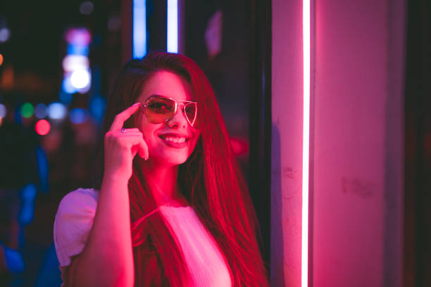 istock Woman and neon light 1160564806