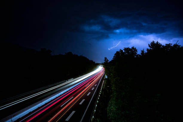istock Thunderstorm With Lightnings Near Highway 1160565066