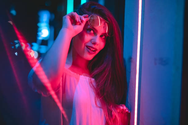 istock Woman and neon light 1160565486