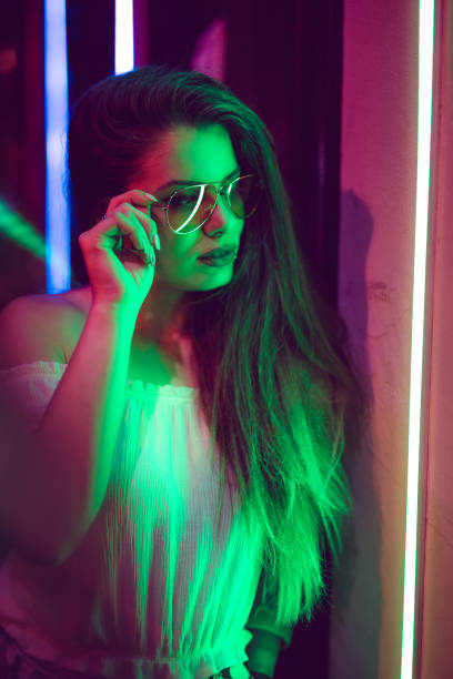 istock Woman and neon light 1160566192
