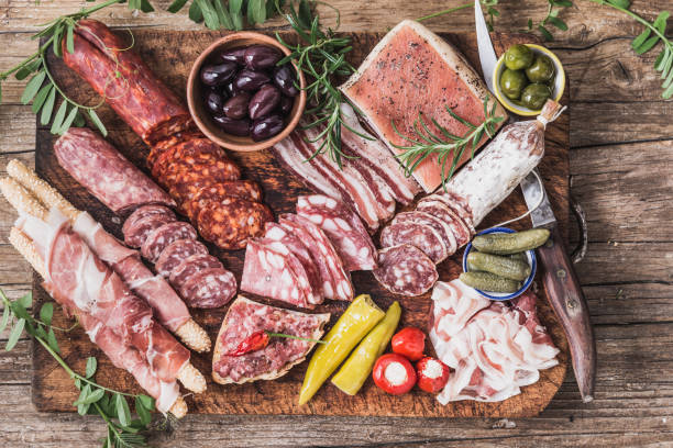 istock Appetizers on wooden board. 1160566425