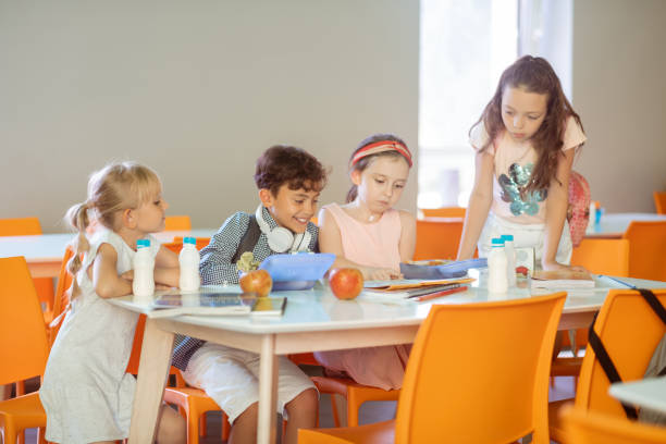 istock Children feeling busy while learning poem and eating lunch 1160569924