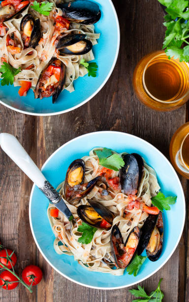 istock homemade pasta with mussels in tomato sauce 1160569976