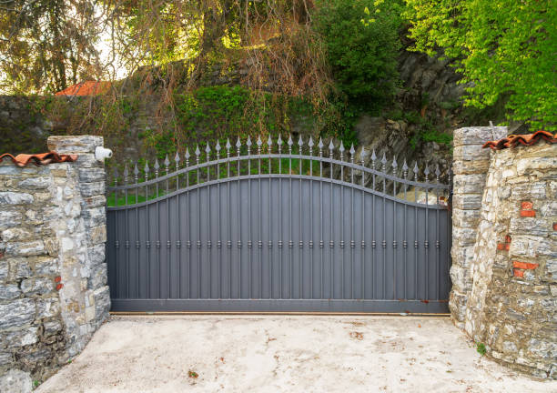 istock Metal gates and security camera. Private property. 1160571200