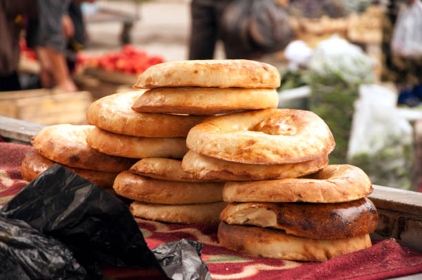 istock Central asian flat bread, selling at the Siab Bazaar in Samarkand 1160571251