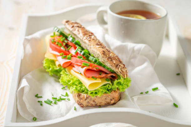 istock Tasty sandwich with ham, chive and cheese for breakfast 1160572688
