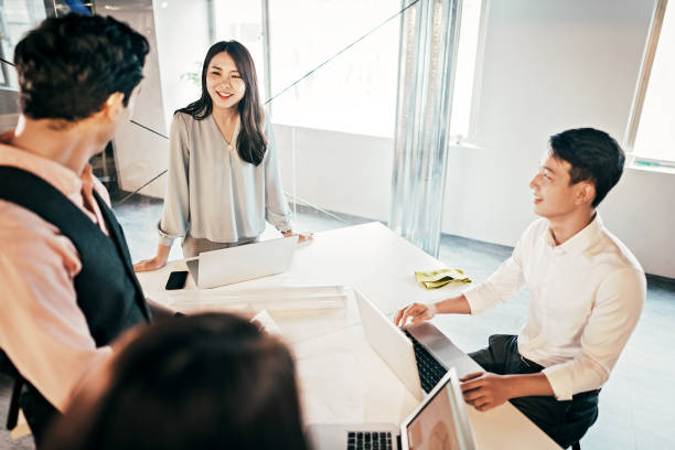 istock Asian Businesswoman presenting her ideas for company development 1160575657