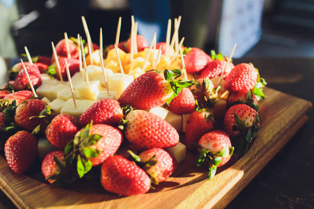 istock Large cheese and fruit party platter on background. 1160576267
