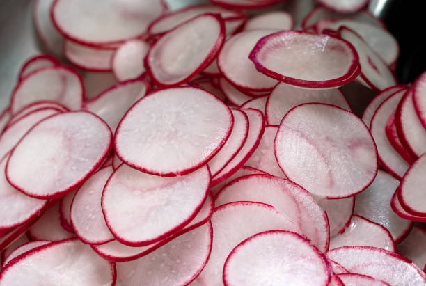 Radish Slices Fresh Food Closeup - Organic fresh vegetables sliced thing and arranged in a stack.