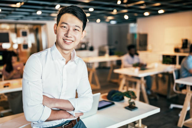 istock Happy Businessman In Co-working Space 1160578419