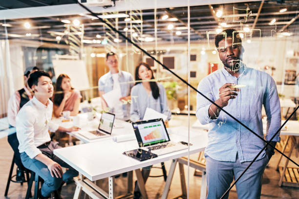 istock Young Group Of Professionals Developing Business Strategy and Providing The Business Plan 1160579248