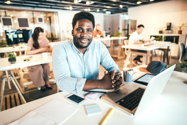 istock Cheerful Man Enjoying co-working Atmosphere In Office 1160579685