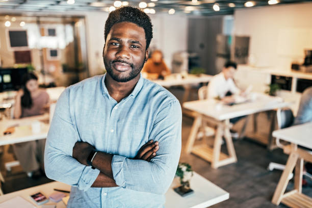 istock Cheerful Man Enjoying co-working Atmosphere In Office 1160580311