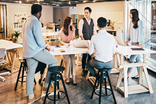 istock Asian Businesswoman presenting her ideas for company development 1160580481