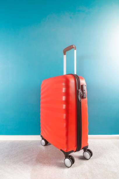istock Bright and stylish cabin size suitcase as holiday concept 1160581961
