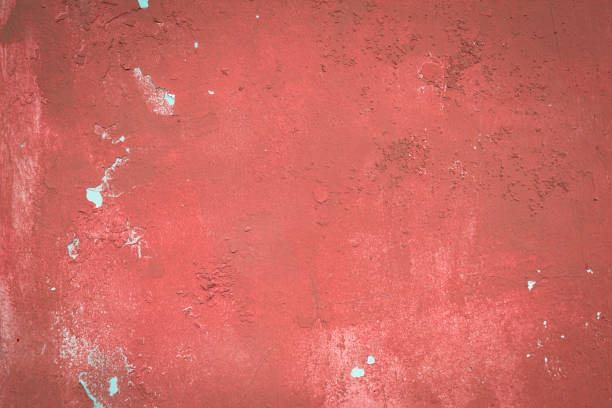 istock Old red pain on white cement wall background 1160582102