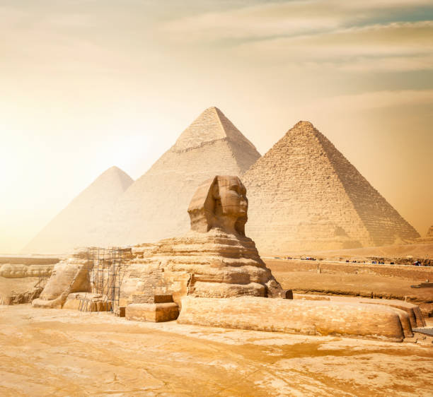Sphinx and pyramids stock photo