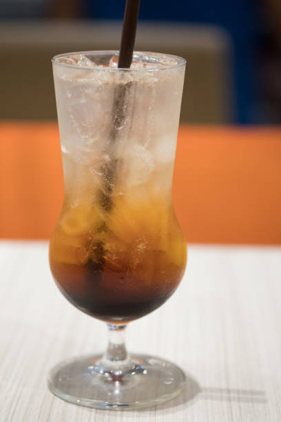 istock Glass of lemon cold iced tea on table 1160585512