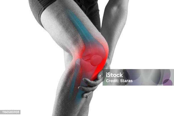 Knee Pain Man With Legs Ache Chiropractic Treatments Concept Isolated On White Background Stock Photo - Download Image Now