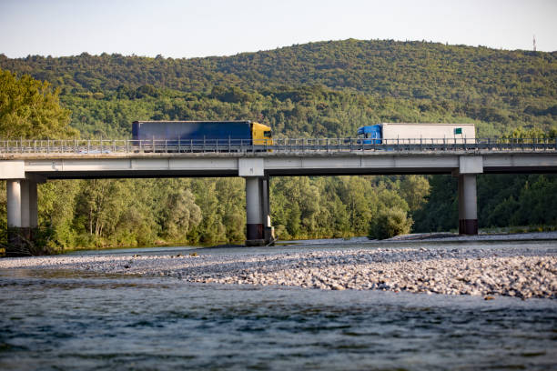 istock Trucks Crossing a Highway Bridge 1160585931