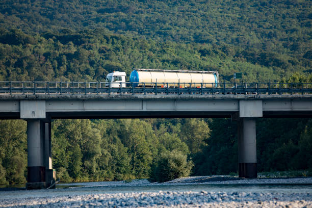 istock Liquid Tanker Truck Crossing Highway Bridge 1160585943