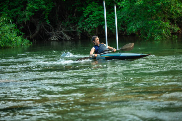 istock Professional female kayaker crossing gates on river 1160588343