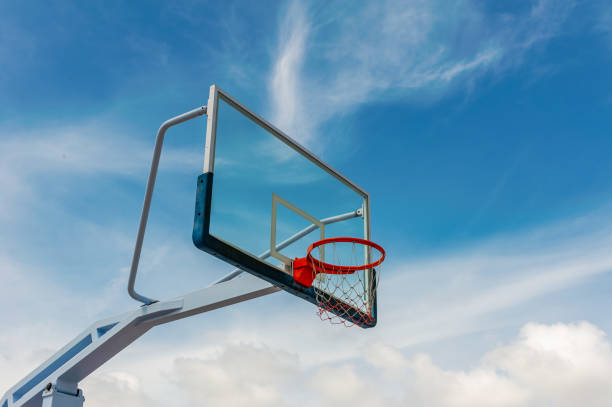 istock Baskesball court with blue sky and cloud 1160590444