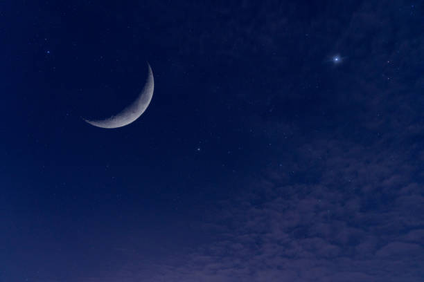 istock Double Exposure, C-shaped section or Crescent of the moon surface with Blue Sky, Star, Cloud. (Astronomy, Atmosphere, Science) 1160591668