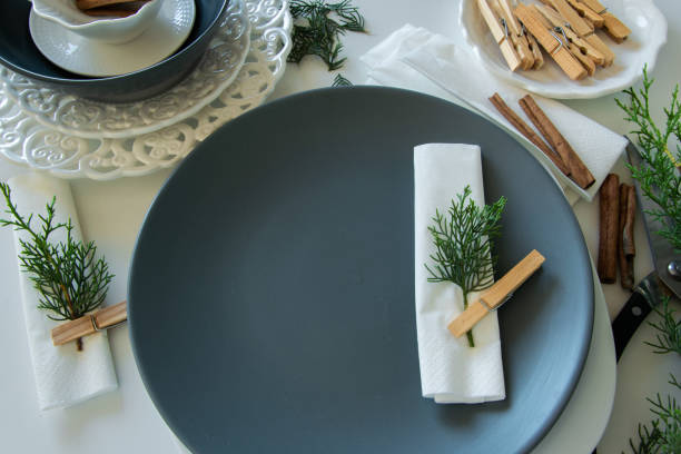 istock Preparations about arranging the table for winter holidays. Winter decoration, DIY 1160592780