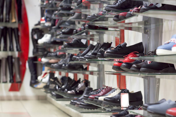 istock Showcase in a Shoe store , shelves with shoes 1160593381