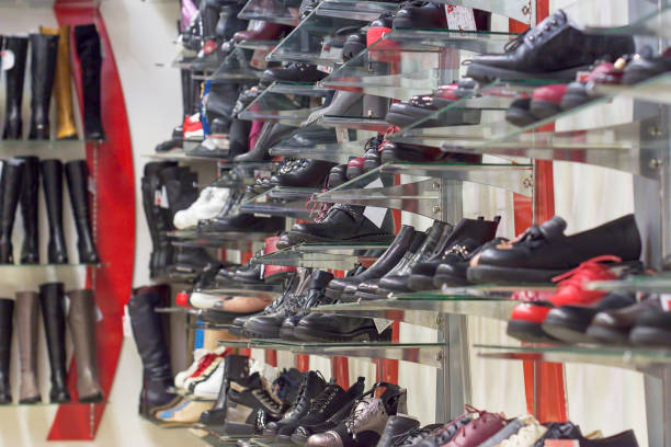 istock Showcase in a Shoe store , shelves with shoes 1160593415