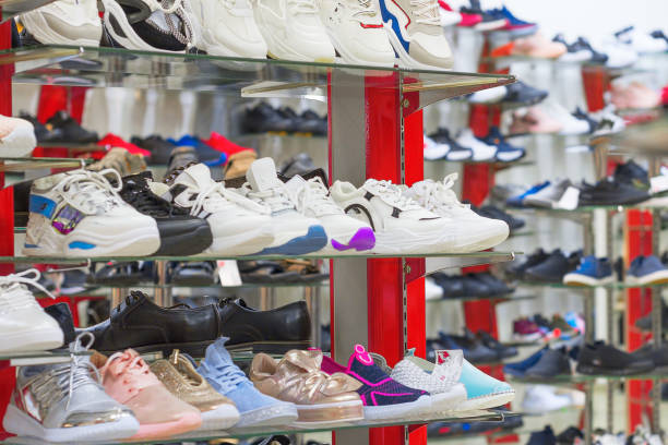 istock Showcase in a Shoe store , shelves with shoes 1160593423