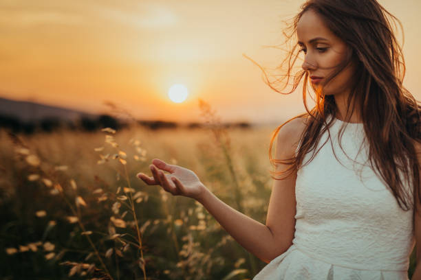 istock Woman in the field 1160594840